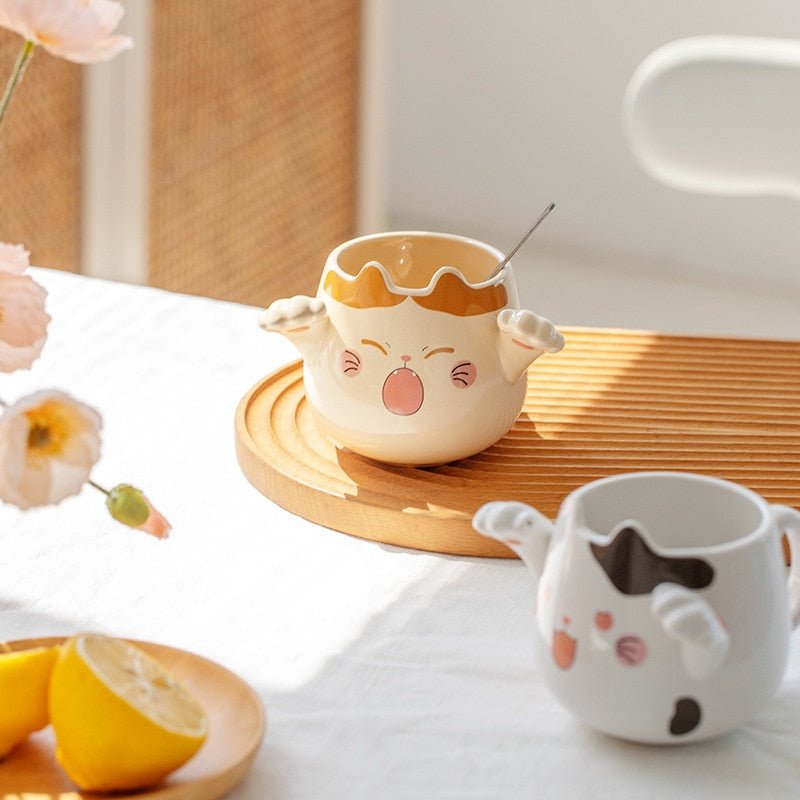 https://hemkonst.com/cdn/shop/products/cute-cat-ceramic-mugs-with-spoons-606449.jpg?v=1670008950&width=1445