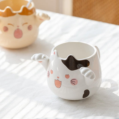 https://hemkonst.com/cdn/shop/products/cute-cat-ceramic-mugs-with-spoons-632666.jpg?v=1670008950&width=416
