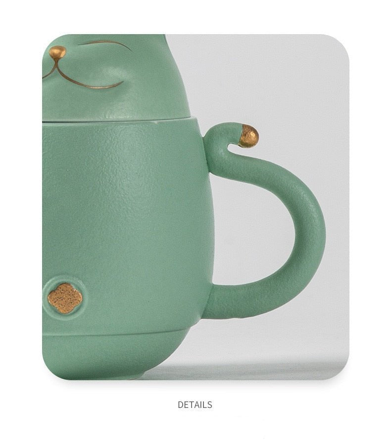 https://hemkonst.com/cdn/shop/products/luwu-lucky-cat-ceramic-tea-mug-with-infuser-909477.jpg?v=1677911000&width=1445